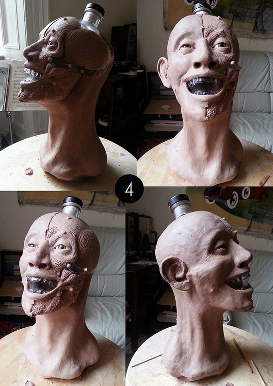 Escultura em garrafa de bebida