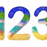 Números de endereço para casa de praia com pintura tropical