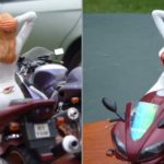 Motociclista sensual de macacão em miniatura esculpida à mão