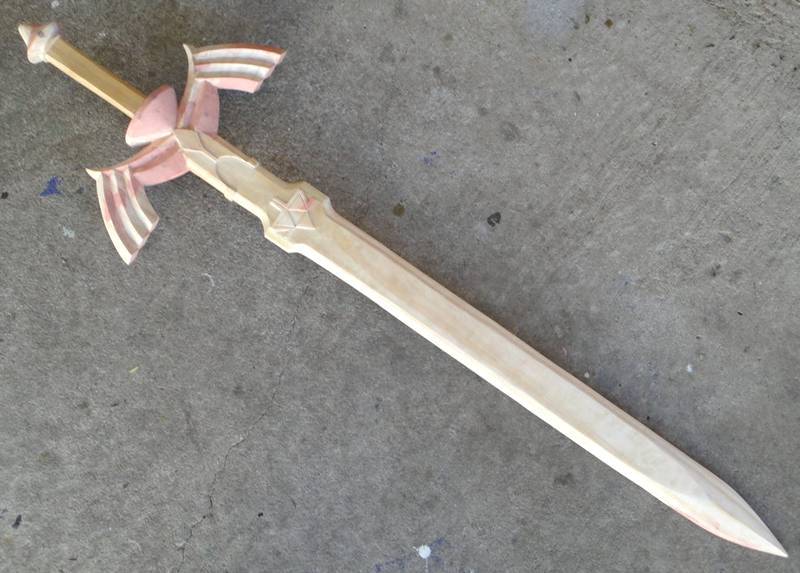Réplica em miniatura de espada
