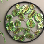 Folhas de samambaia e costela-de-adão em painel 3D de metal