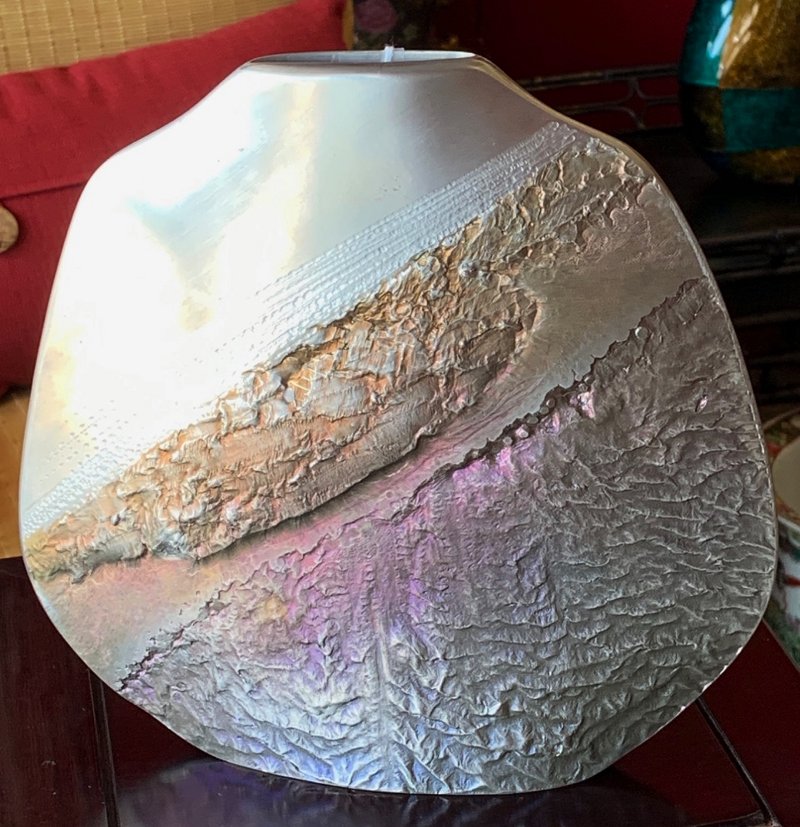Escultura de metal