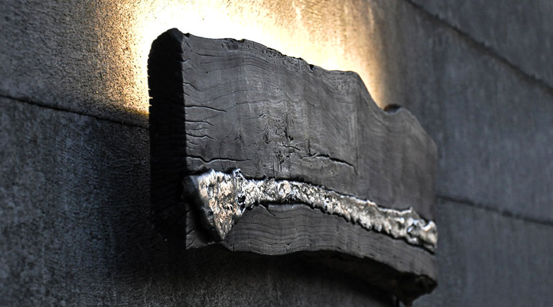 Decoração com alumínio embutido em tábua de demolição