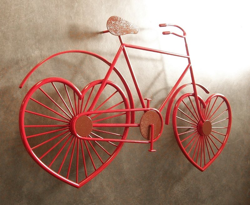 Painel de parede com bicicleta vermelha